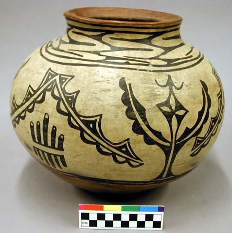 Pottery olla Globular, concavity in base, short outcurving neck. Base and rim