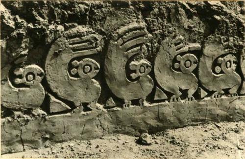 Frieze in high relief showing stylized animal, possibly a viscacha or squirrel