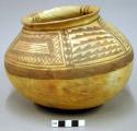 Jar, polacca polychrome style d. prehistoric design. 16.2 x 21.6 cm.