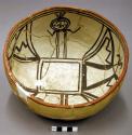 Bowl, polacca polychrome style c. int: clown design; ext: slipped, no design. 11