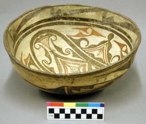 Polychrome pottery bowl - red, white, brown