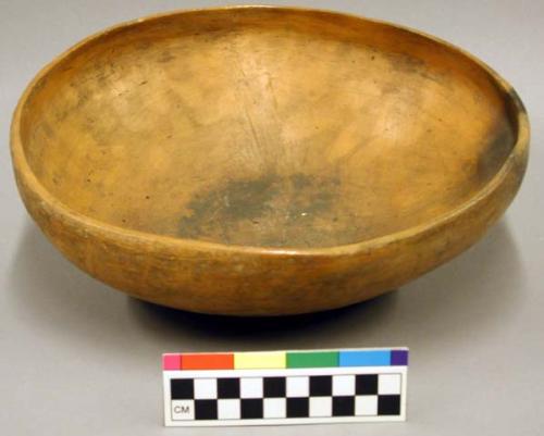 Plain red pottery bowl