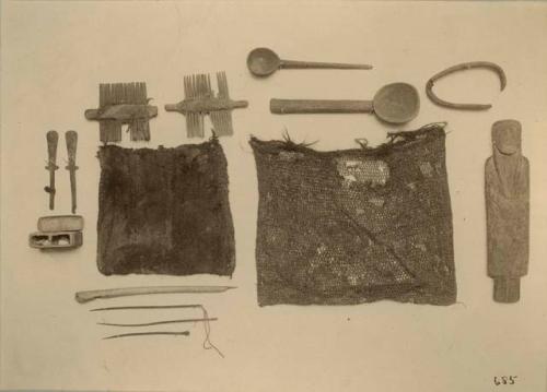 Woven bags with tools, spoons, needles and figure