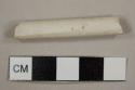 Kaolin/White ball clay pipe stem fragment with 6/64 in bore hole