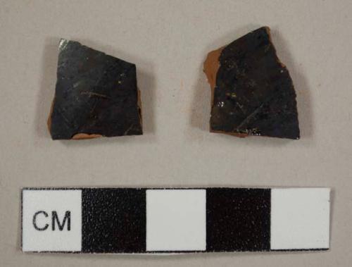 Black lead-glazed sherds with refined red earthenware, possibly Jackfield-type sherds