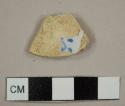 Tin-glazed earthenware sherd with hand-painted, blue-on-white decoration