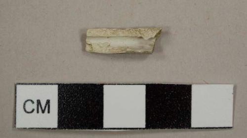Kaolin/White ball clay pipe stem fragment; 6/64 in bore diameter