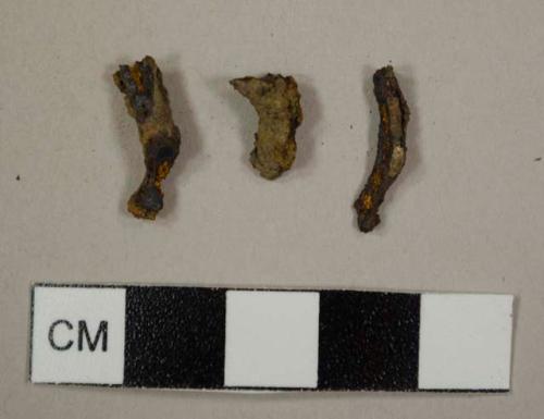 Iron fragments, possibly from nails