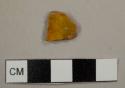 Yellowish lead-glazed red earthenware sherd