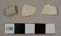 Refined white bodied earthenware sherds, including one stone