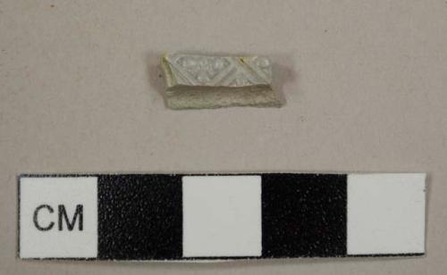 Gray salt-glazed stoneware sherd with "dot, diaper, and basket" pattern