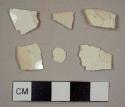 Creamware sherds, including one feather-edged plate rim