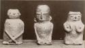 Three clay figures