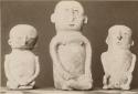 Three clay figures