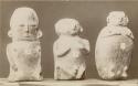 Three clay figures