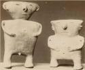 Two clay figures