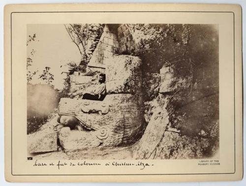 Man sitting on base of column, Chichen Itza