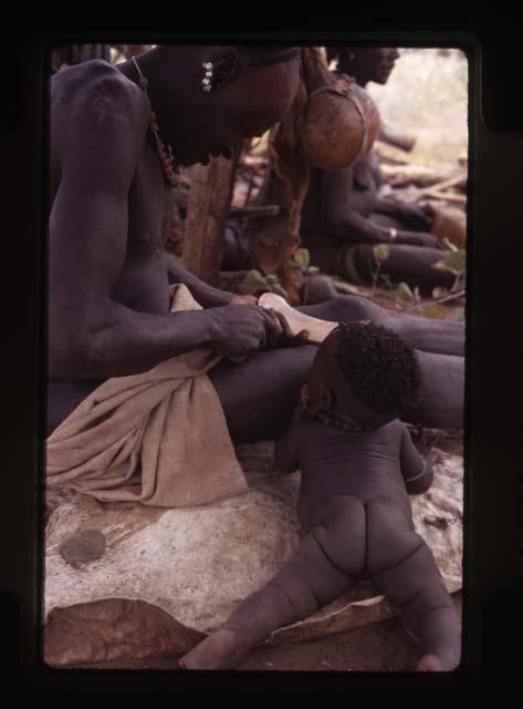 Hamar father with infant daughter - Ethiopia