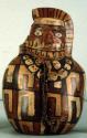 Human effigy bottle with polychrome painting