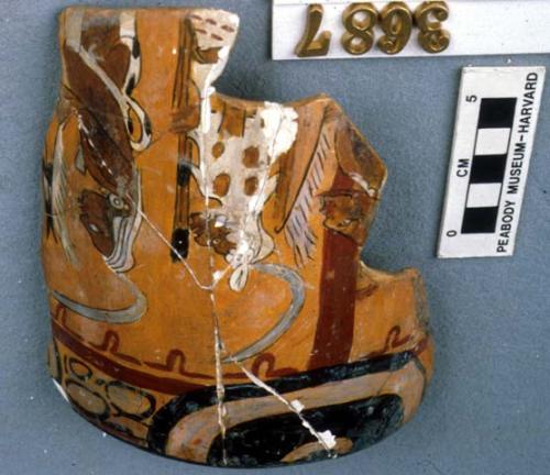 Wooden model of polychrome sherd with human figure