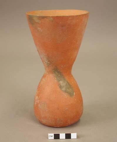 Tall red pot with bulbous bottom