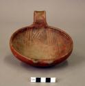 1 pottery bowl with linear designs