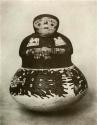 Gourd shaped ceramic vase decorated as human figure