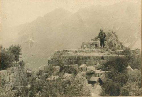 Man stands atop ruins of Pisac