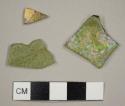 Olive green curved glass fragment, including one possibly from a casement bottle