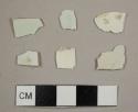 Pearlware sherds, including one plate frim sherd