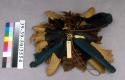 Feathered headdress, blue, tan & black, brown & green feathers with fibre attach