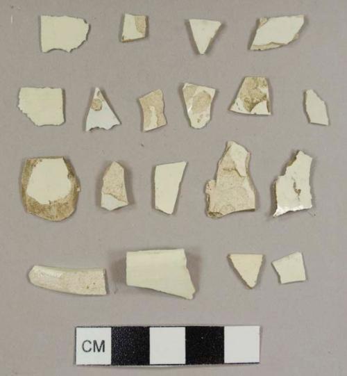 Creamware sherds, including one foot ring fragment, two rim sherds to bowls, and one rim sherd to an unknown hollowware vessel