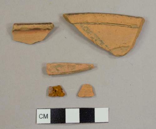 Lead-glazed, red earthenware sherds, including one rim sherd to a pan and two rim sherds for open vessels