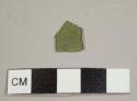 Olive green flat glass fragment