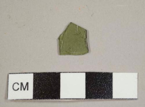 Olive green flat glass fragment