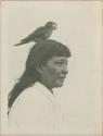 Woman with bird on her head
