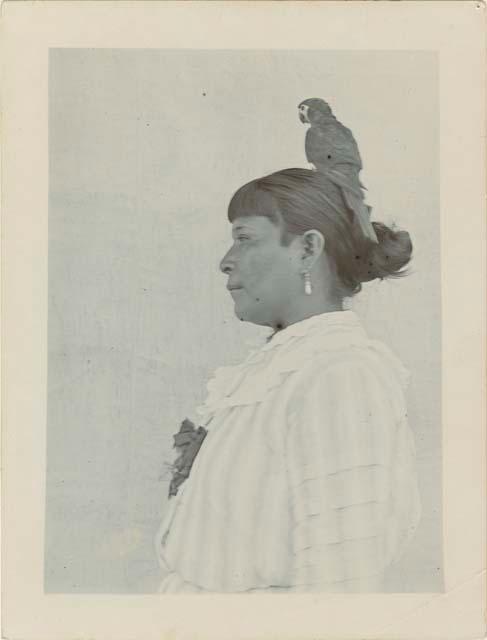 Janet, with bird perched on her head