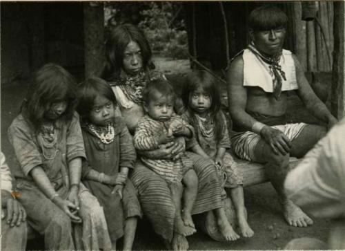 Chief of the Indios Colorados (far right), a woman and four children