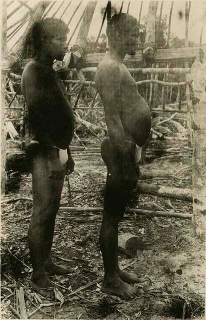 Two men, in profile