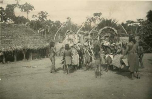 Men dancing in ceremonial costume