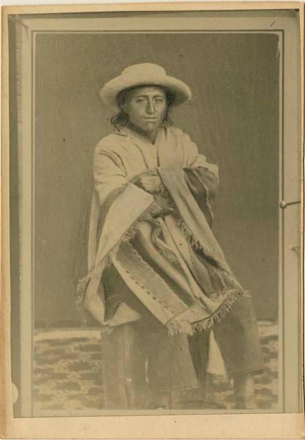 Studio portrait of man sitting