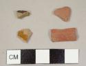 Red earthenware sherds, two lead glazed and two unglazed but with refined paste
