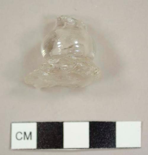 Wineglass stem or stopper fragment of colorless glass