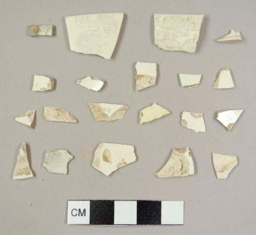 Creamware sherds, including 16 body sherds, one footring from unidentified vessel, one cup rim sherd, and two bowl rim sherds from different vessels