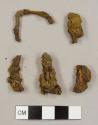 Metal fragments, possibly from a belt or apparel buckle