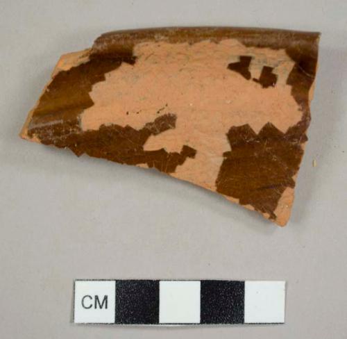 Earthenware, lead glazed, red; rim sherd from a milkpan with a diameter of approximately 40 cm