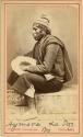 Studio portrait of man sitting