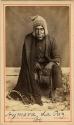 Studio portrait of man sitting