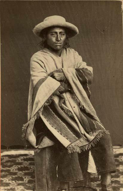 Studio portrait of man sitting