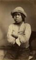 Studio portrait of boy sitting